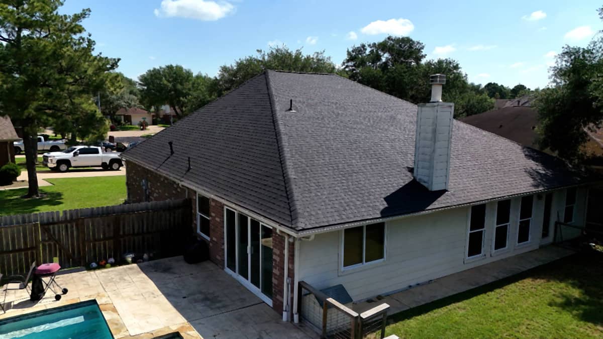 Crisp new charcoal GAF shingle roof on the same Katy, TX home after replacement