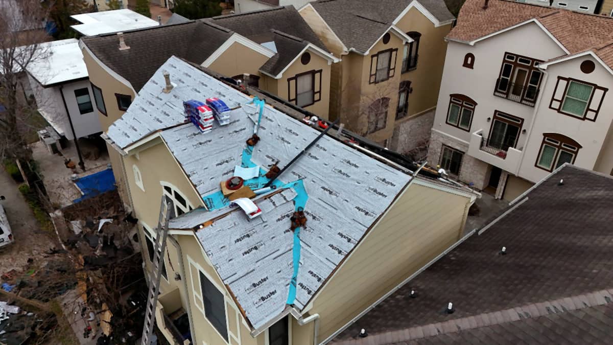 Aerial view of a Rice Military, Houston roof dried in with synthetic underlayment and self-adhered membrane in the valleys