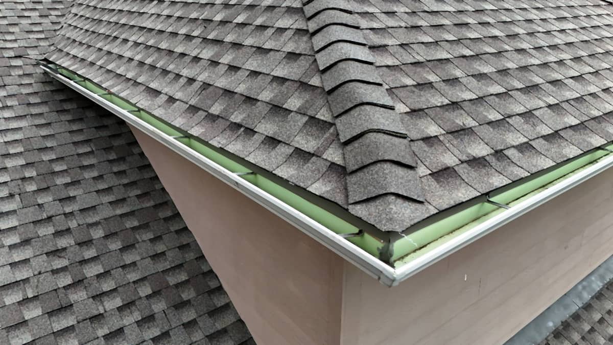 Close-up of new metal drip edge installed on a Tomball, TX roof replacement